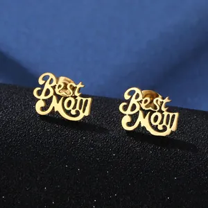 Elegant 18K gold-plated Best Mom stud earrings set on a dark textured display base