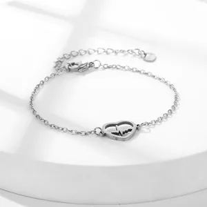 Silver stainless steel heart bracelet with EKG heartbeat design and adjustable lobster clasp
