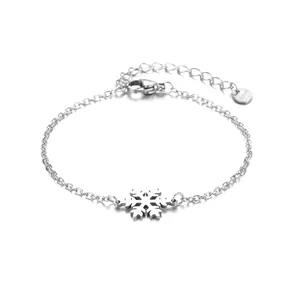 Polished stainless steel snowflake pendant bracelet with adjustable cross chain for women