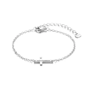 Bracelet croix en acier inoxydable poli avec chaîne réglable et fermoir mousqueton sûr