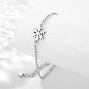 Polished stainless steel snowflake pendant bracelet with adjustable heart tag chain