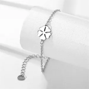 Polished stainless steel chain bracelet with minimalist hollowed four-leaf clover charm