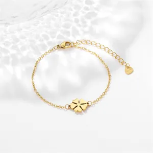 Polished gold stainless steel hollow clover charm bracelet with adjustable O-chain link