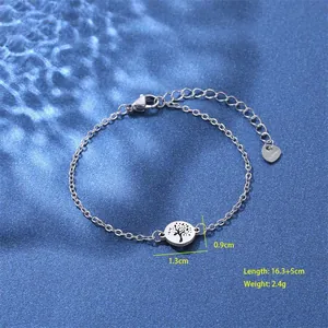 Detail of tree of life charm on stainless steel bracelet with dimensions and size info
