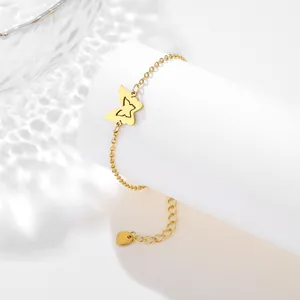 Polished gold butterfly pendant bracelet with an adjustable O-link chain for women