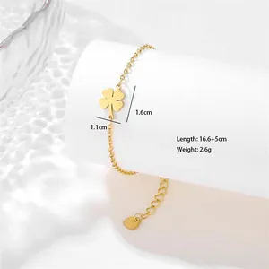 Detailed view of golden clover bracelet with dimensions and brushed metal texture