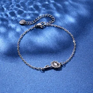 Elegant stainless steel flower pendant bracelet with adjustable chain on blue water background