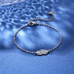 Polished stainless steel flower bracelet on blue water ripple background for women