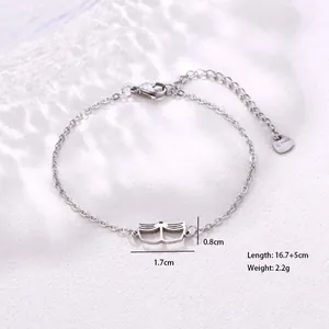 Macro shot of stainless steel book pendant bracelet with size specs and lobster clasp