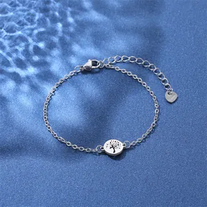 Polished silver stainless steel chain bracelet featuring an intricate Tree of Life charm