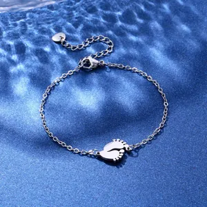 Polished stainless steel bracelet featuring a delicate baby footprints Y-shaped pendant