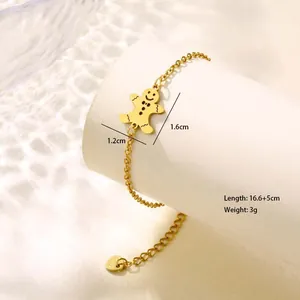 Detail of gold snowman pendant bracelet showing dimensions 1.2x1.6cm and adjustable chain