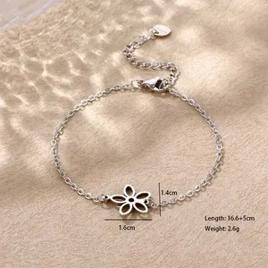 Detail showing hollow flower pendant size 1.6cm x 1.4cm and 16.6+5cm adjustable chain