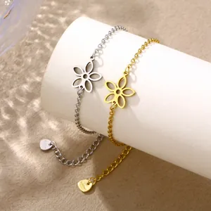 Hollow flower pendant bracelets in gold and silver stainless steel with heart tags