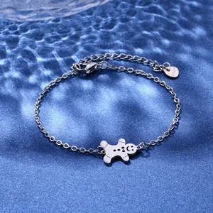 Stainless steel chain bracelet featuring a cute gingerbread man pendant and adjustable clasp