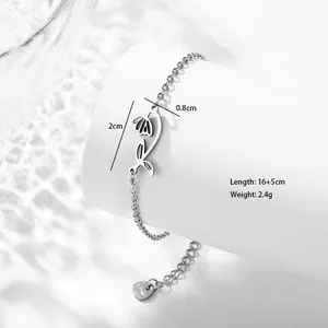 Detail of stainless steel tulip pendant bracelet showing delicate hollow flower design