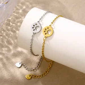 Bracelet en acier inoxydable poli avec pendentif patte creuse en or et argent