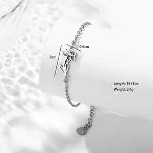 Detail showing hollow flower pendant dimensions 2cm x 0.9cm on stainless steel bracelet