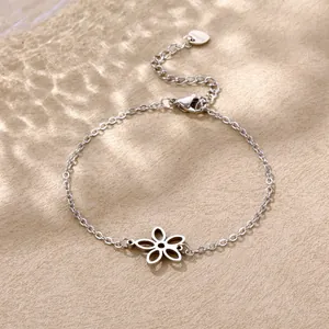 Detailed view of silver stainless steel chain bracelet featuring a hollow flower charm