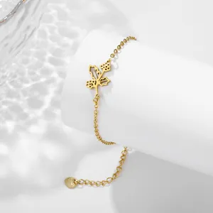 Bracelet en acier inoxydable doré avec feuille de houx et breloque en cœur