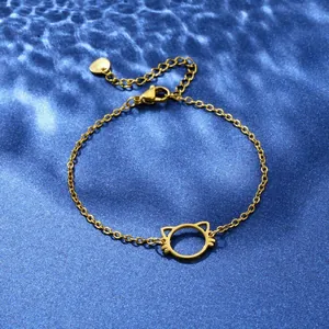 Detailed view of golden cat-shaped pendant on stainless steel chain with lobster clasp