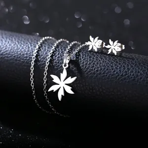 Polished stainless steel flower necklace and stud earrings set with leaf-shaped pendants
