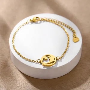 Gold stainless steel dolphin charm bracelet with hollow circular design and fine chain link