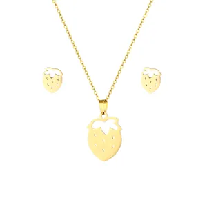 Golden stainless steel jewelry set featuring hollow strawberry necklace and stud earrings