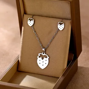 Polished stainless steel strawberry jewelry set with necklace and earrings in a gift box