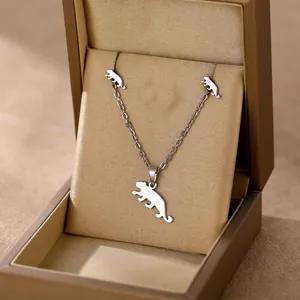 Polished stainless steel leopard necklace and earring set in a gold luxury gift box