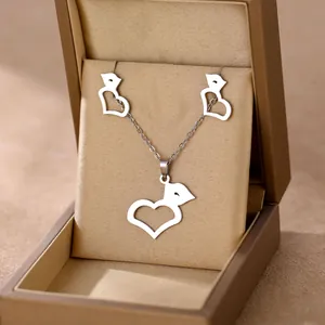 Polished stainless steel heart and lip necklace and earrings set in a premium gift box