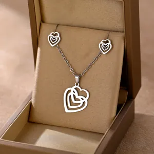 Polished stainless steel interlocking heart necklace and stud earrings jewelry set