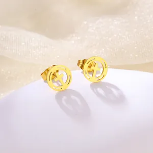 Elegant gold stainless steel stud earrings with hollow circle and cross symbol on white stand
