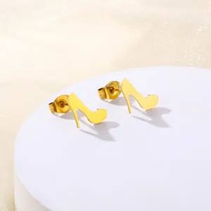 Minimalist gold stainless steel high heel stud earrings on a white display stand