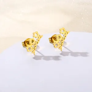 Elegant gold hollow flower vine earrings in stainless steel on white pedestal