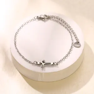 Bracelet croix en acier inoxydable avec gravure Jésus sur un plateau en pierre