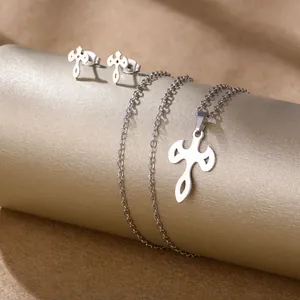 Polished stainless steel jewelry set featuring hollow cross necklace and stud earrings