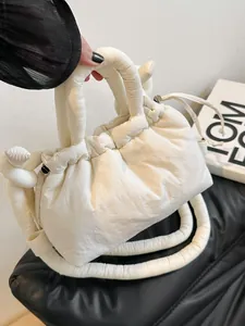 Modern off-white puffy cloud handbag with drawstring closure and thick tubular handles