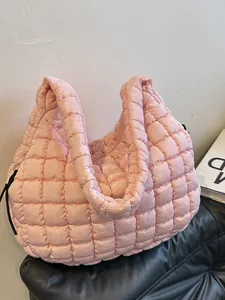 Pale pink quilted bubble cloud bag with padded shoulder strap and large capacity