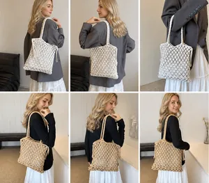 Detail showing hand-woven bohemian mesh tote bag with tassels in ivory and khaki tones