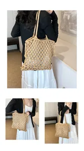 Detail of bohemian woven tote bag with fringe tassels and large mesh shoulder strap
