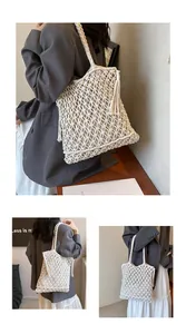 Detail of white woven net tote bag with fringe tassels and shoulder strap for summer beach