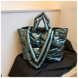 Metallic green puffer tote bag with quilted padding and large capacity handles