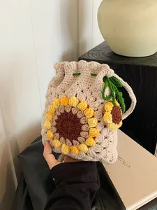 Handmade crochet sunflower drawstring bucket bag in beige knit cotton for women