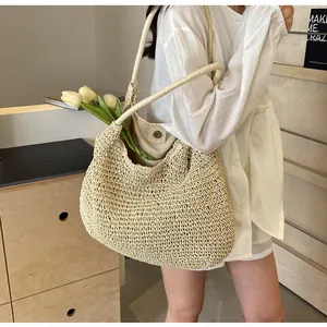Close-up of beige woven tote bag with soft fabric lining and magnetic metal button closure