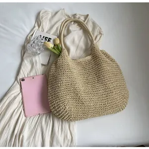 Detail of handwoven straw tote bag texture with elegant summer beach vacation props