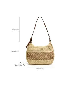Handmade woven straw shoulder bag with leather strap and product size dimensions