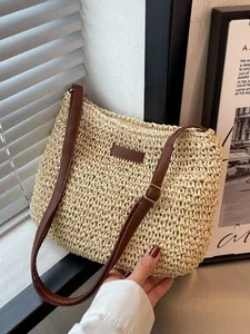 Borsa a tracolla vintage in paglia intrecciata con cinturino in pelle per la spiaggia