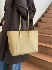 Retro large capacity light khaki leather tote bag for women showing commuting style