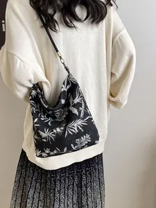 New Chinese style floral embroidery shoulder bag with black fabric and silver metal buckle